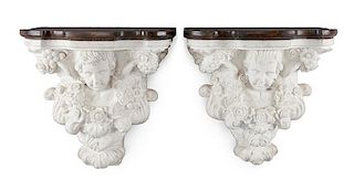 A Pair of Italian Marble Brackets Height 19 x width 20 x depth 11 inches.