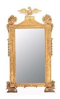 An Italian Neoclassical Giltwood Pier Mirror Height 85 x width 54 inches.