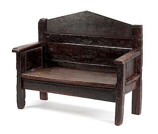 A Spanish Renaissance Revival Hall Bench Height 40 x width 47 1/2 x depth 22 1/2 inches.