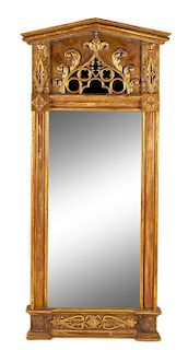 A Swedish Neoclassical Parcel Gilt Pier Mirror Height 76 x width 35 inches.
