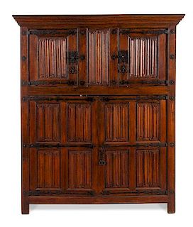 A Dutch Linen-Fold Carved Oak Cabinet Height 75 7/8 x width 59 x depth 22 inches.