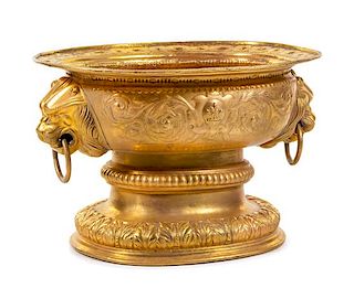 A Large Gilt Metal Jardiniere Height 17 x width 25 inches.