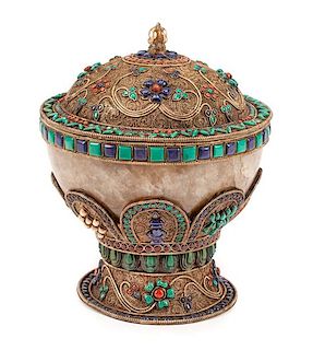 A Gilt Metal Filigree and Stone Mounted Rock Crystal Bowl and Cover Height 13 x diameter 10 1/2 inches.