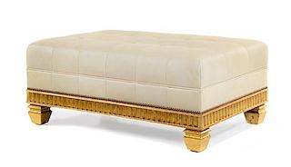 A Continental Style Leather Upholstered Giltwood Ottoman Height 18 1/4 x width 43 1/8 x depth 29 inches.
