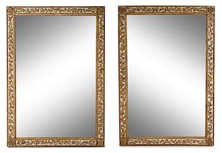 A Pair of Continental Painted and Parcel Gilt Mirrors Height 62 x width 42 inches.