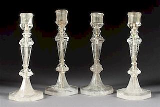 A Set of Four Rock Crystal Candlesticks Height 9 inches.