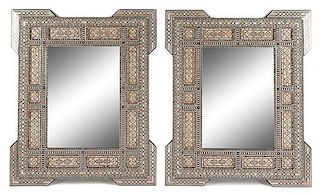 A Pair of Moorish Style Mother-of-Pearl Inlaid Mirrors Height 46 x width 37 1/2 inches.