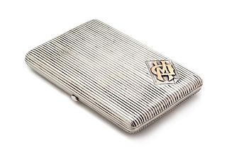 * A Russian Silver and 10-Karat Rose Gold Mounted Cigarette Case, Mark of Ivan Krutikov, Moscow, 19th Century, the reeded case w