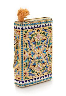 * A Russian Silver-Gilt and Enamel Cigarette Case, Mark of Ivan Saltykov, Moscow, Late 19th Century, the case with polychrome en