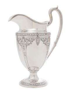 * An American Silver Water Pitcher, Gorham Mfg. Co., Providence, RI, 1926, Cinderella pattern, the body with an engraved monogra