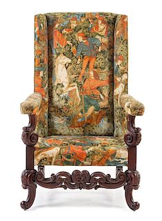 A Jacobean Style Wingback Armchair Height 50 inches.