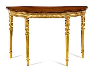 A George III Giltwood, Satinwood and Marquetry Console Table Height 33 3/4 x width 52 1/4 x depth 21 1/2 inches.