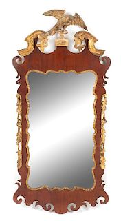 A George III Parcel Gilt Mahogany Mirror Height 47 1/4 x width 23 inches.