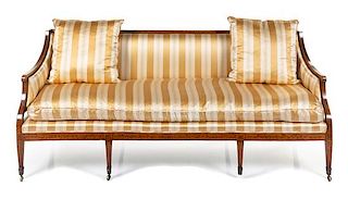 A George III Stenciled Satinwood Sofa Height 33 1/2 x width 75 1/2 x depth 26 inches.