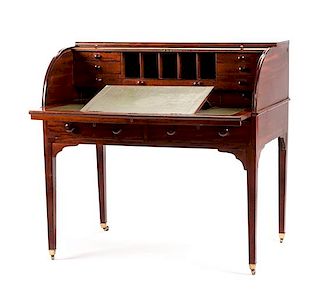 A Georgian Style Mahogany Cylinder Desk Height 42 x width 42 1/4 x depth 28 1/2 inches.