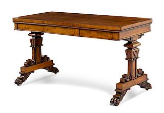 A Regency Rosewood Library Table Height 28 1/2 x width 56 x depth 27 inches.