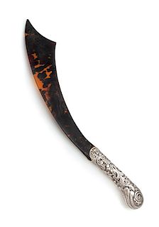 * A Victorian Silver Mounted Tortoise Shell Page Turner, Maker's Mark Obscured, London, 1889, in the form of a scimitar.