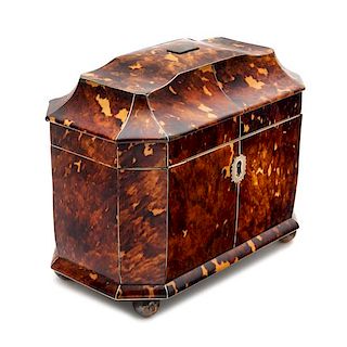* An English Silver Lined Tortoise Shell Tea Caddy Height 6 1/2 x width 7 1/2 x depth 4 1/4 inches.