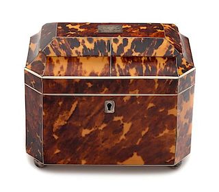 * An English Silver Lined Tortoise Shell Tea Caddy Height 6 x width 6 3/4 inches.