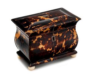 * An English Silver-Inlaid Tortoise Shell Tea Caddy Height 4 1/4 x width 5 5/8 inches.