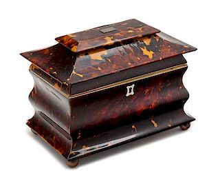 * An English Silver-Inlaid Tortoise Shell Tea Caddy Height 6 x width 8 inches.