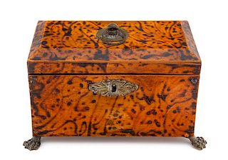 * A Faux Tortoise Shell and Gilt Metal Mounted Tea Caddy Height 4 3/4 x width 8 inches.