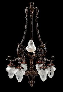 An American Neoclassical Patinated Bronze and Frosted Glass Chandelier Height 42 x diameter 25 inches.