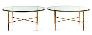 A Pair of Gilt Iron and Glass Low Tables Height 22 x width 44 x depth 34 inches.