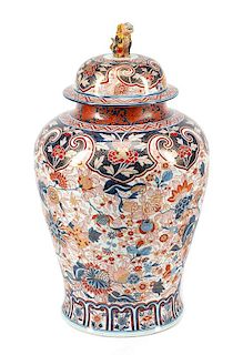 A Large Imari Palette Porcelain Jar and Cover Height 33 inches.