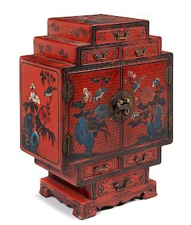 A Chinese Export Red Lacquered Table Cabinet Height 24 x width 18 x depth 10 inches.