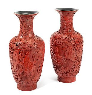 A Pair of Chinese Cinnabar Vases Height 25 x diameter 11 inches.