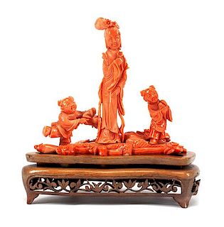 A Chinese Carved Coral Figural Group Width 6 1/4 inches.