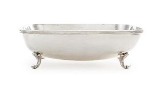 An Italian Silver Bowl, Buccellati, Mid 20th Century, of rounded rectangular form with applied reeded rim, raised on four scroll