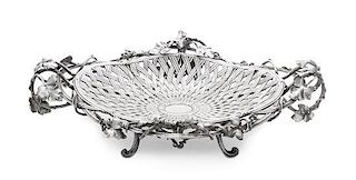 * A French Silver Basket, Odiot, Paris, Second Half 19th Century, of shallow oval boat shape, formed as a woven basket and raise