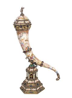 An Austrian Silver-Gilt and Enamel Cornucopia on Stand, Ludwig Politzer, Vienna, Circa 1890, the horn painted with Classical sce