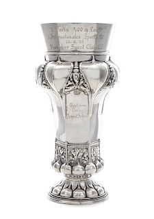* A German Silver Vase, Wilhelm Muller, Berlin, Circa 1925, the circular base chased with lobes, the hexagonal stem chased with