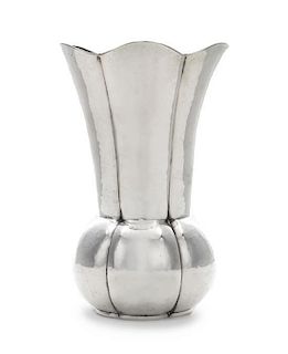 * A German Silver Vase, Otto Wolter, Schwabisch Gmund, Circa 1920, lightly spot-hammered, with bulbous lobed lower body and conf