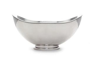 * A Continental Silver Bowl, Probably German, Circa 1930, of oval boat form with lightly spot-hammered surface and reeded rim, o