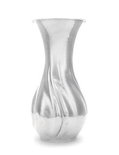 * A German Silver Vase, Maker's Mark L&Co., Circa 1920, spot-hammered of baluster form chased with sweeping lobes