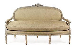 A Louis XVI Painted Sofa Height 44 1/2 x width 72 inches.