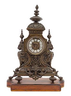 * A French Neoclassical Bronze Mantel Clock Height 17 x width 14 1/2 x depth 7 1/4 inches.