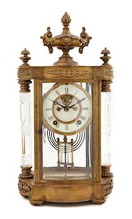 * A French Gilt Bronze and Cut Glass Regulator Clock Height 17 1/2 x width 8 x depth 5 inches.