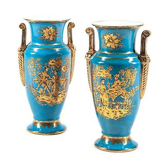 A Pair of Paris Porcelain Urns Height 17 inches.