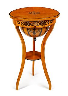A Biedermeier Marquetry Sewing Table Height 30 1/2 x diameter of top 20 inches.