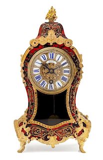 * A German Boulle Marquetry Mantel Clock Height 12 1/2 x width 6 1/4 x depth 3 1/2 inches.