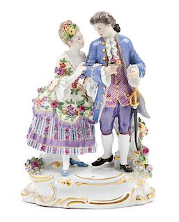 A Meissen Porcelain Figural Group Height 7 1/2 inches.