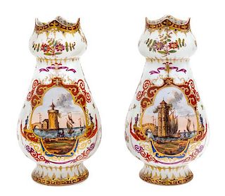 A Pair of Dresden Painted Porcelain Vases Height 9 1/2 inches.