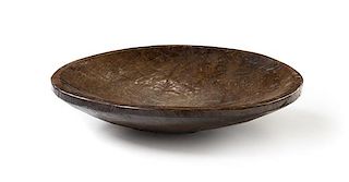 A Large Provincial Carved Wood Dough Bowl Diameter 32 inches.