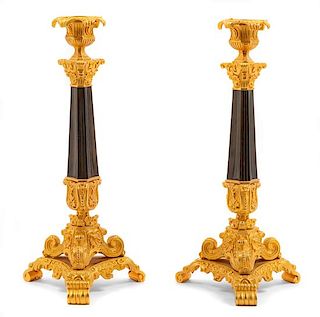 A Pair of Continental Gilt Bronze Candlesticks Height 12 1/8 inches.