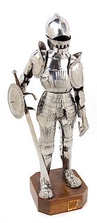 A Silvered Metal Model of a Suit of Armor Height 25 inches.